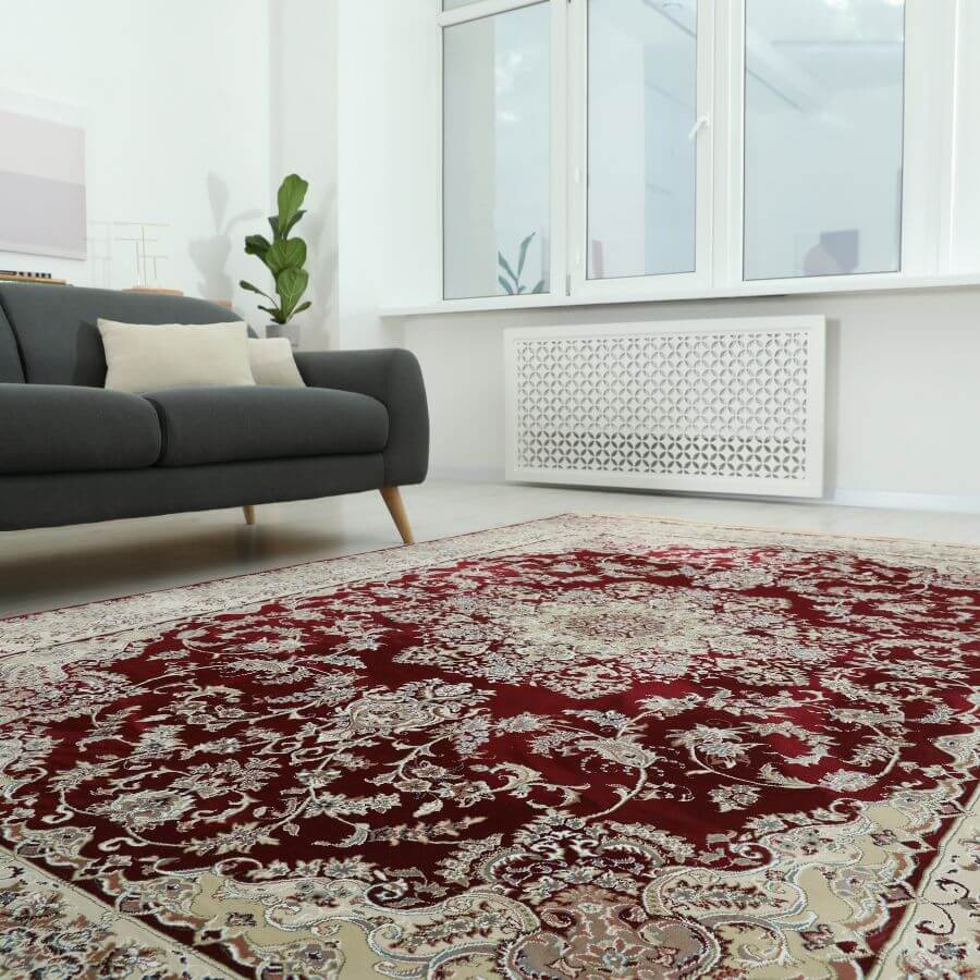 Deep red medallion rug in a modern living room